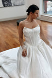 Basque waist satin wedding dress with pockets and train. Beautiful elegant satin bridal dress for the elegant and modern bride. Basque waist is the trendiest wedding dress style in the upcoming season.