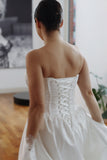 Basque waist satin wedding dress with pockets and train. Beautiful elegant satin bridal dress for the elegant and modern bride. Basque waist is the trendiest wedding dress style in the upcoming season.