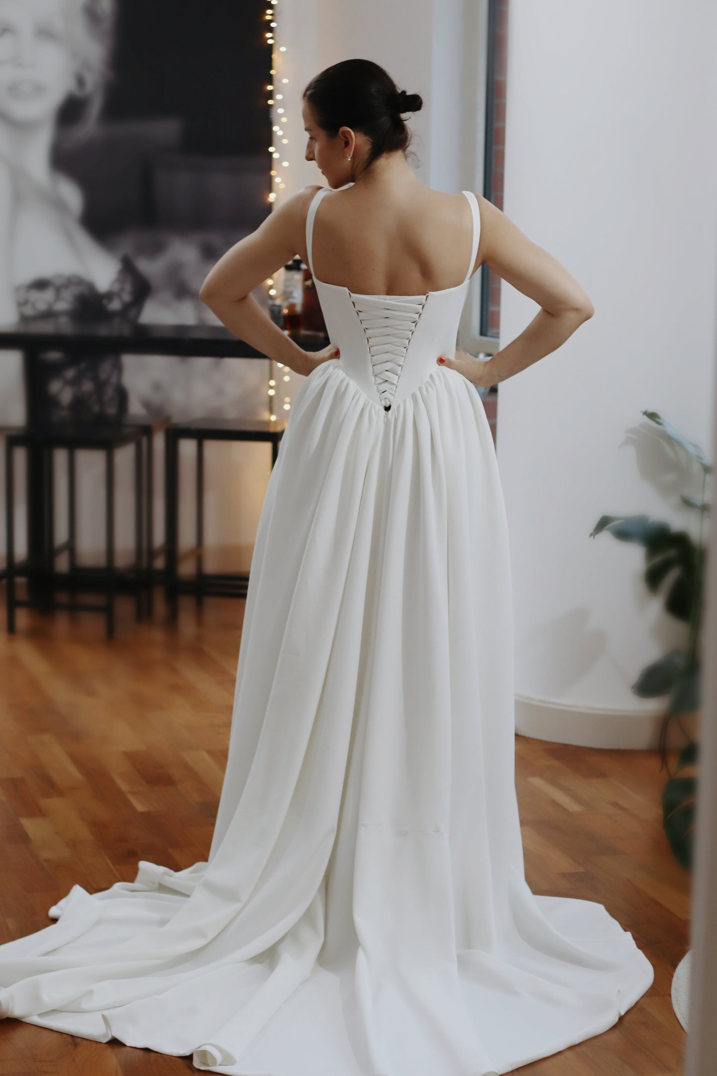 Introducing Hope - a newest addition to our luxury crepe wedding dress collection. &nbsp;Basque waist wedding dresses are leading the bridal fashion trends this year, with their signature V-shaped waistline captivating brides everywhere. Our luxury crepe basque waist bridal gown beautifully blends timeless charm with contemporary elegance, designed to make any bride feel exquisite. Crafted from premium crepe fabric, this gown offers a smooth, graceful drape that complements its striking silhouette.