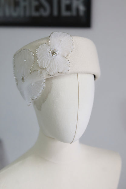 Pillbox Hat with Pearl and Lace Embellishments