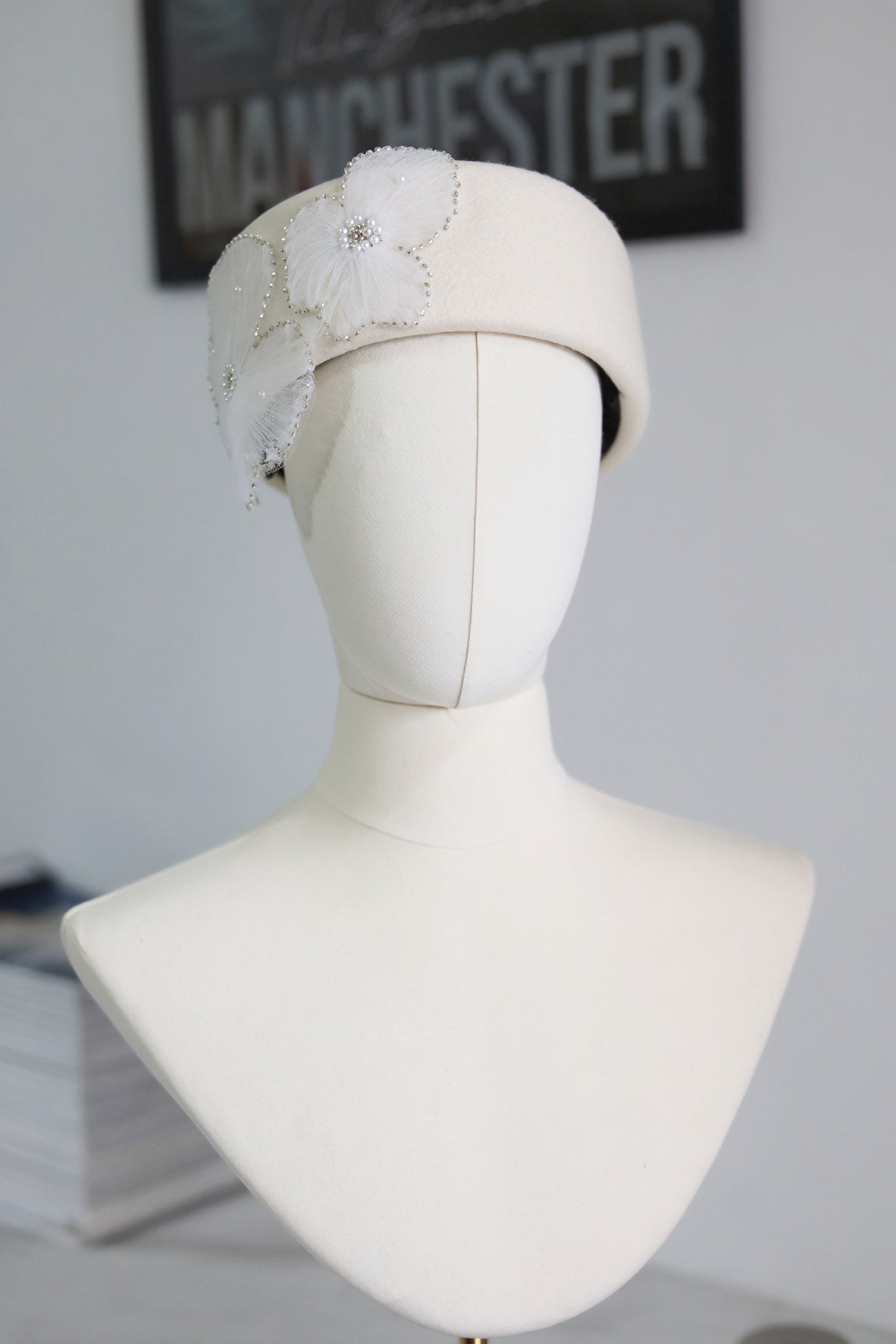 Pillbox Hat with Pearl and Lace Embellishments