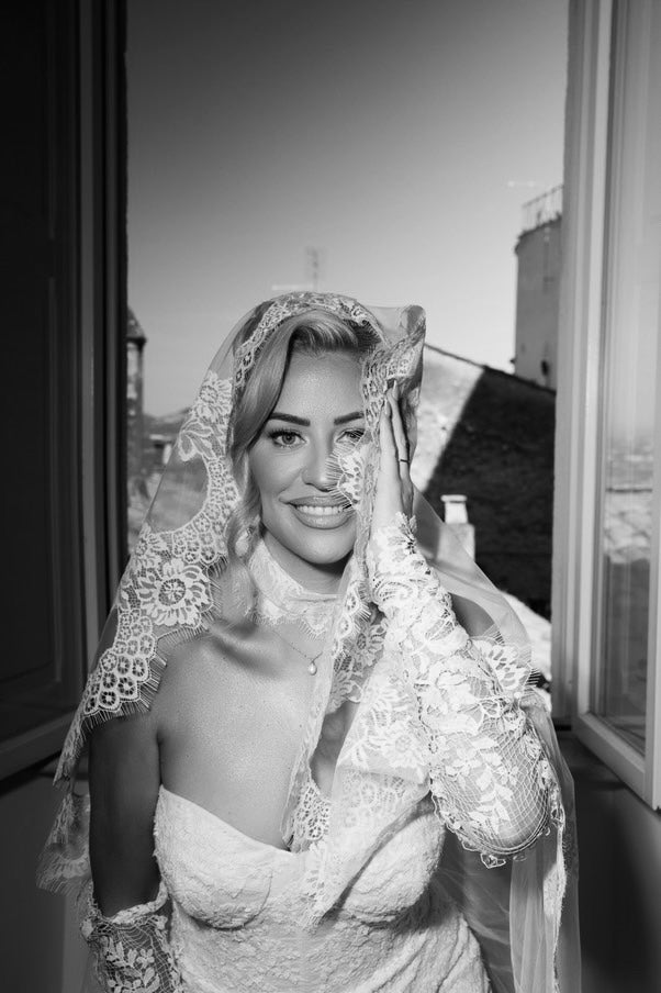 Lace wedding dress with matching lace veil and chantilly lace bridal choker. 