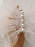 Off-the-shoulder pearl bridal shawl